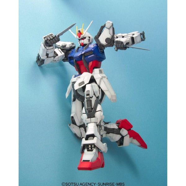Bandai 1/60 PG Strike Gundam action pose with weapon.s
