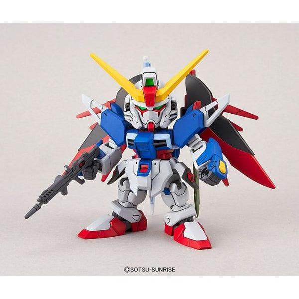 Bandai SD Gundam EX-Standard Destiny Gundam action pose with weapon. 