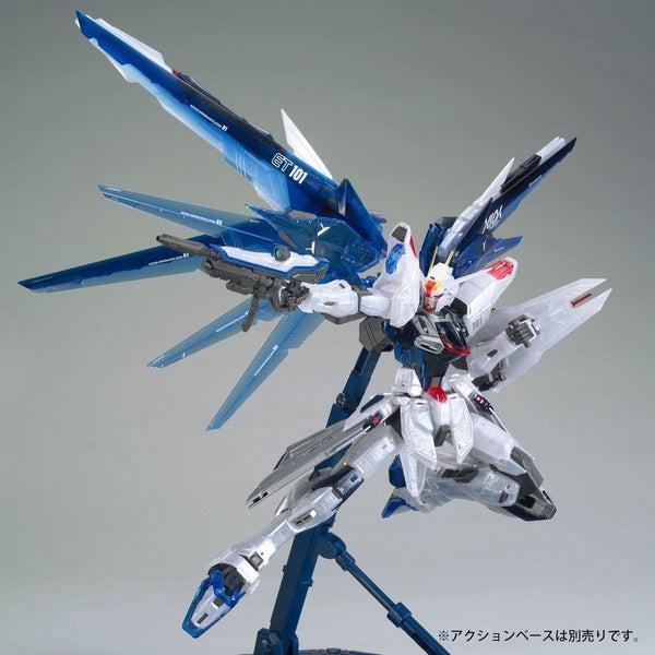 Bandai MG 1/100 Gundam Base Limited Freedom Gundam Ver.2.0 [Clear Color] action pose