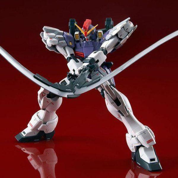 PRE-ORDER P-Bandai MG 1/100 Gundam Sandrock Custom EW [Reissue] action pose with weapon. 