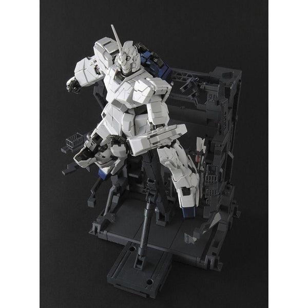 Bandai 1/100 MG Unicorn Gundam (HD Col/MS Cage) leaping from cage